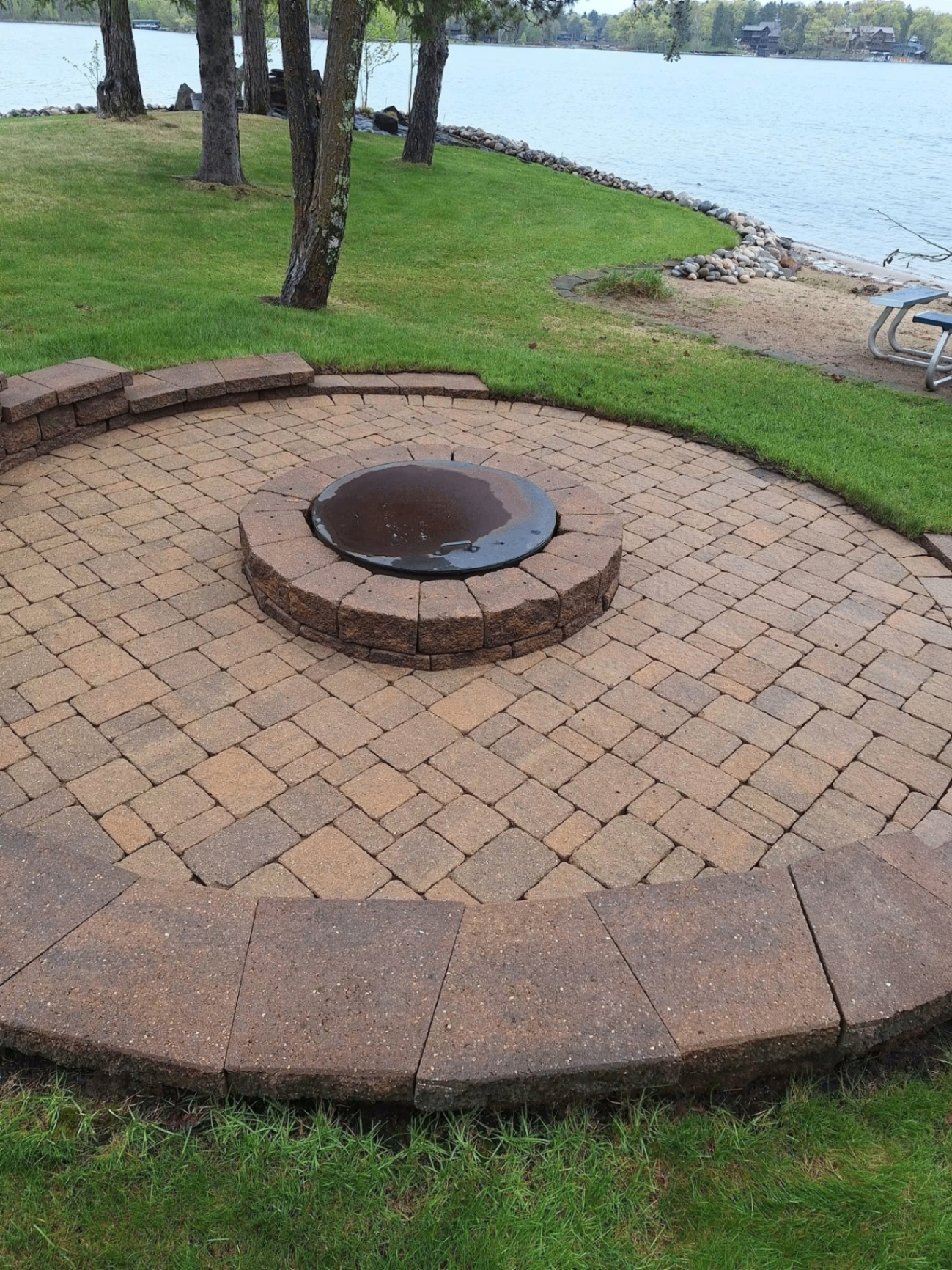 Same paver fire pit patio cleaned and restored by the lake