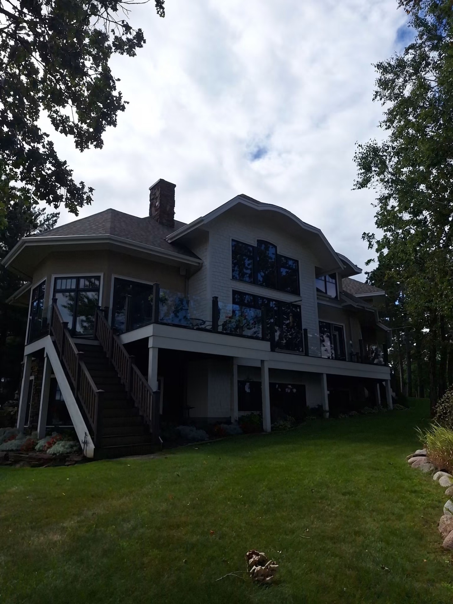 Lakeside home with expansive windows, professionally cleaned