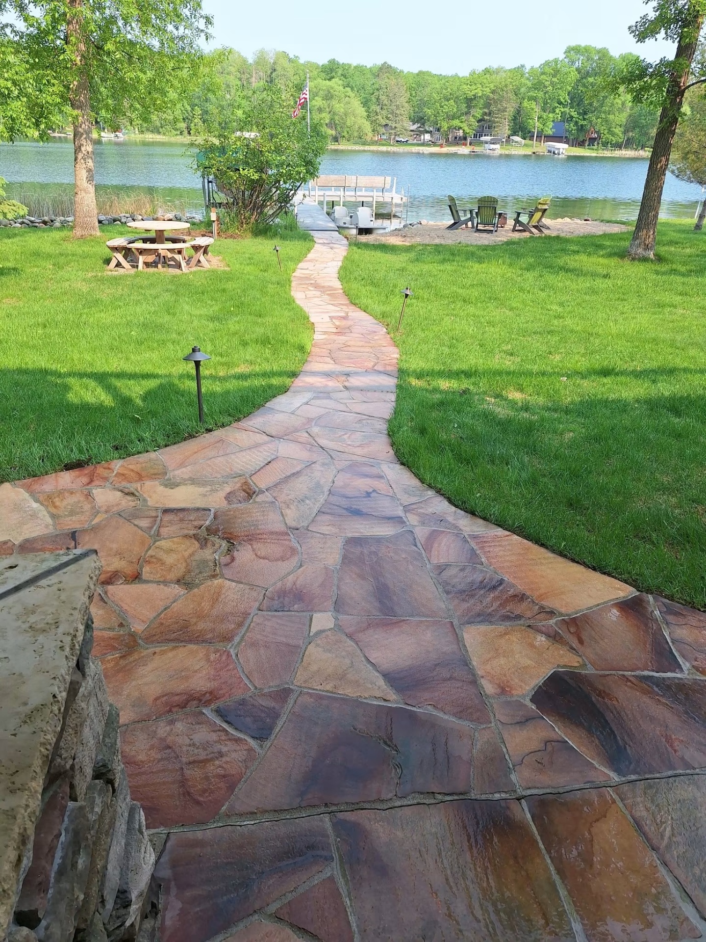 Flagstone lakeside path restored to natural color